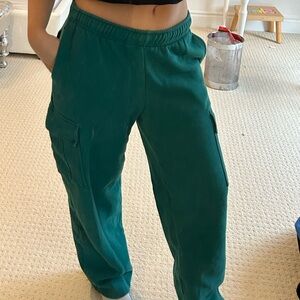 Dark green TNA cargo sweatpants
